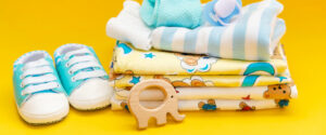 baby accessories newborns colored surface